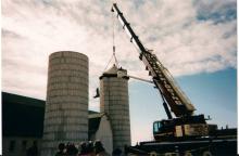 Farm 42_King - Attaching New Silo Roof 2 Photograph around 2000